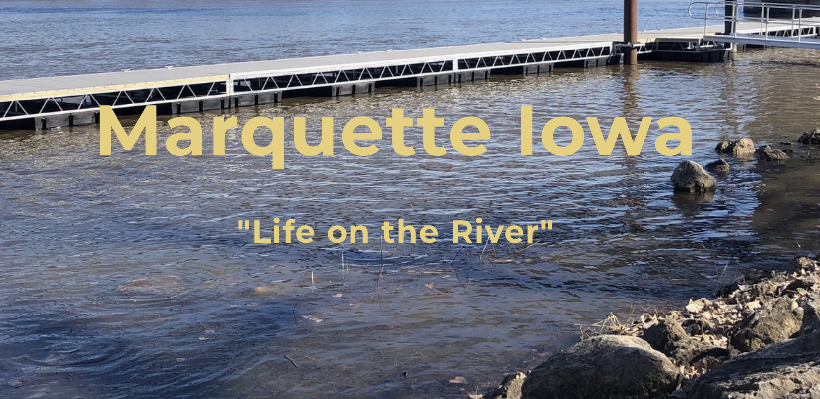 image of river with the words "Marquette, Iowa, Life on the River" on top of image.