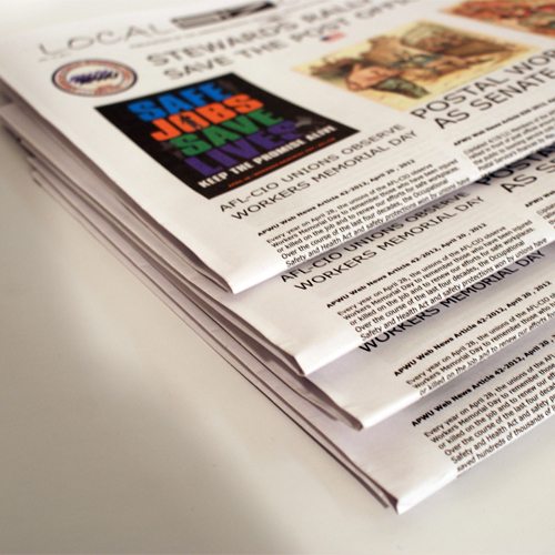 close up of a stack of newspapers