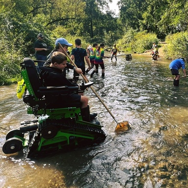 wheelchair in creek