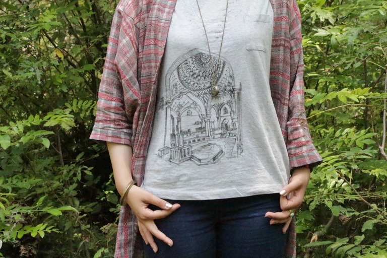 a gray t-shirt with an architectural sketch on it