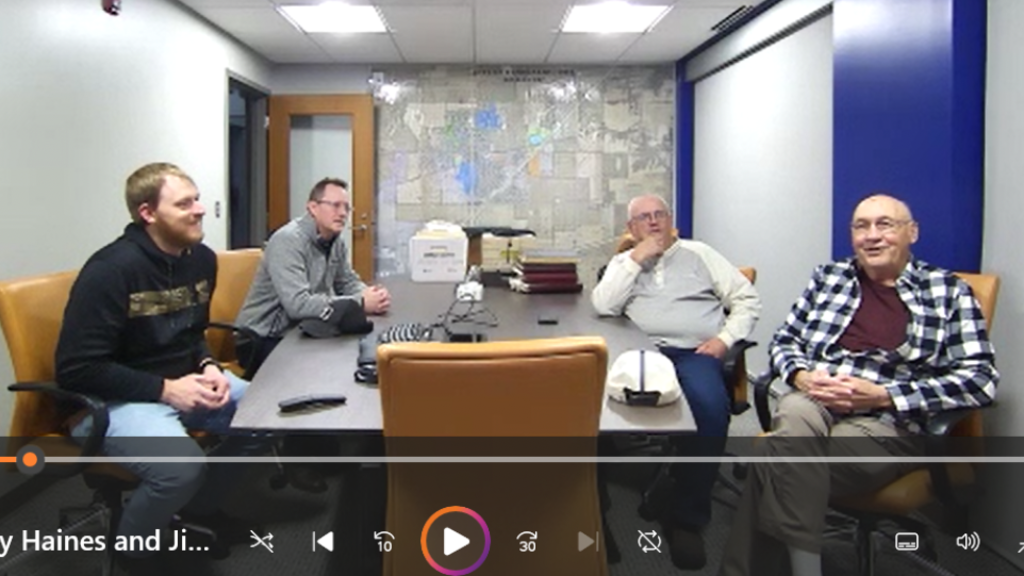 Group of men in a conference room
