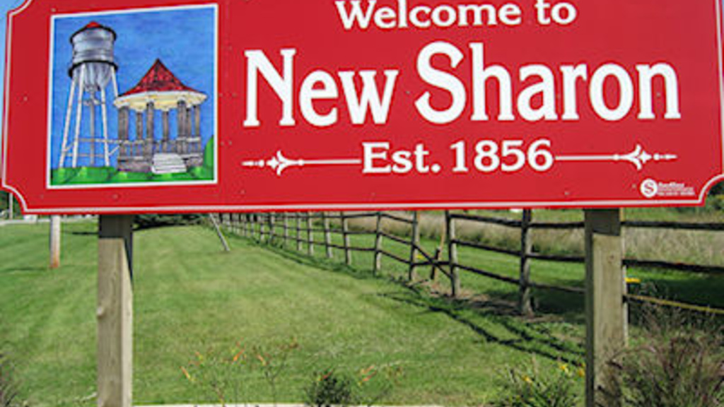 welcome sign to the city of New Sharon