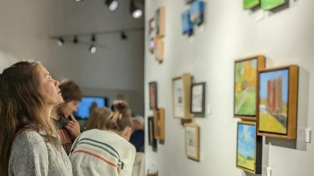 woman looking at art