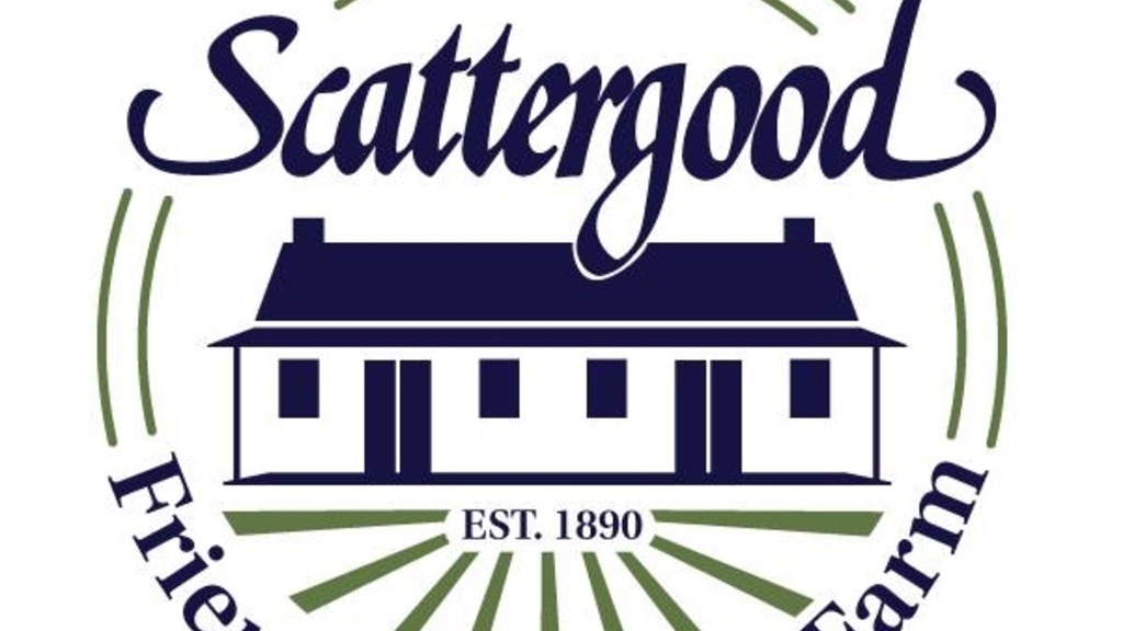 A building with a blue roof in a circle that reads Scatter Goods Friends School & Farm