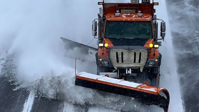 snow plow on highway