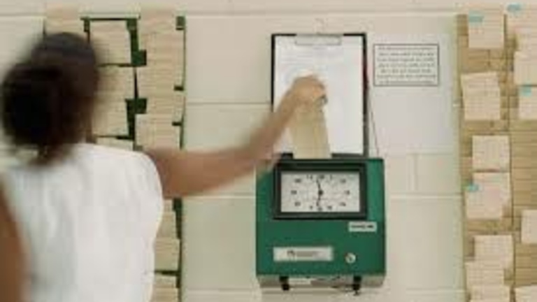 person with a work time card
